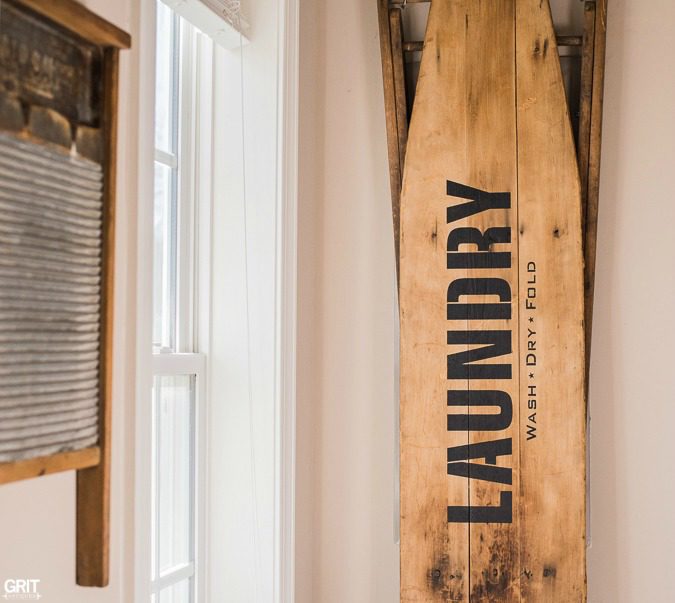 Laundry Room Sign. Using a Vintage Ironing board & Funk Junk's Old Sign Stencils I made a sign to cover the breaker box in our laundry room.