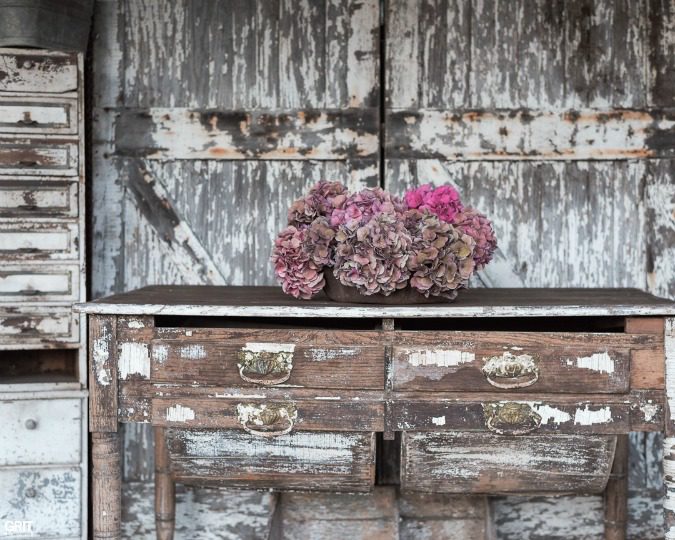 Flea Market Decor styled with dried hydrangeas and old doors.