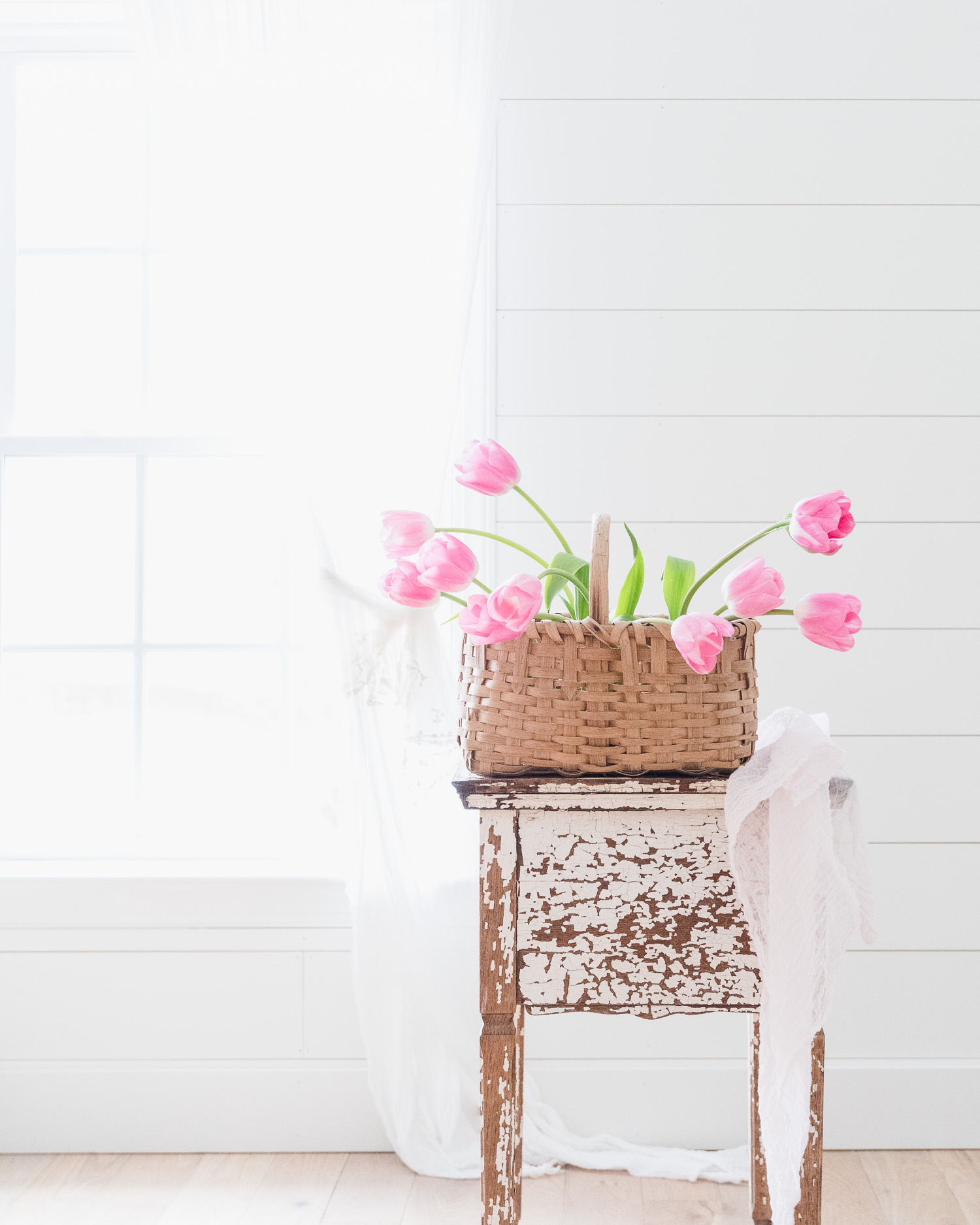 Vintage Basket filled with tulips.